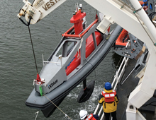 The DriX in its LARS is launched over the side of the NOAA Ship Thomas Jefferson.