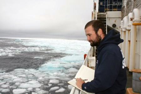 Matt Ayre observing sea ice from Healy's deck.